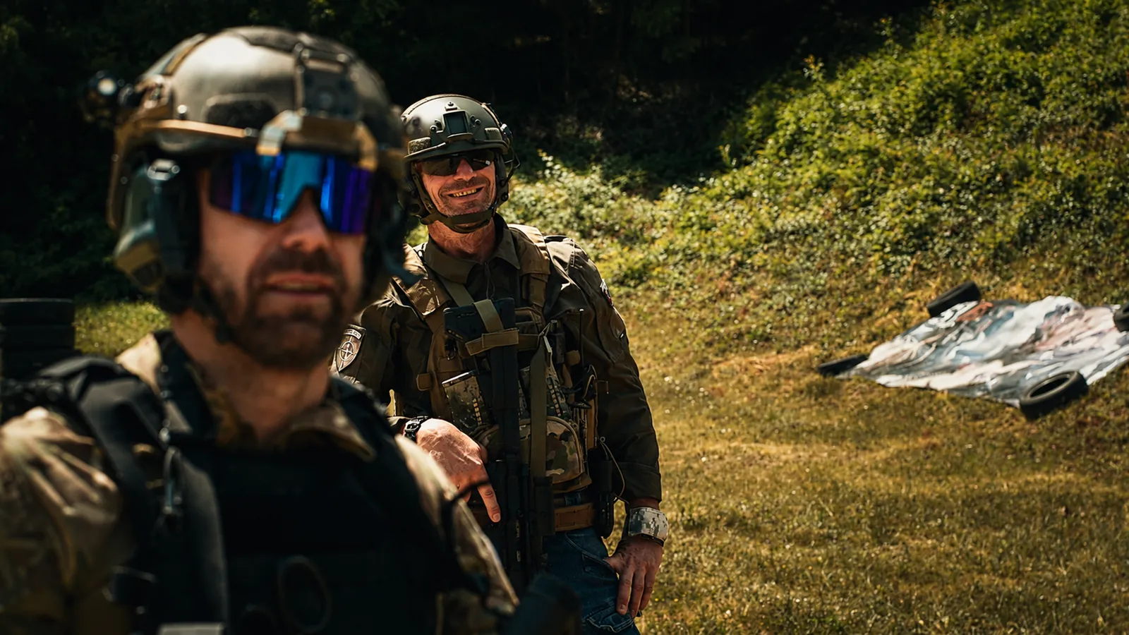 Two instructors in helmets on the range